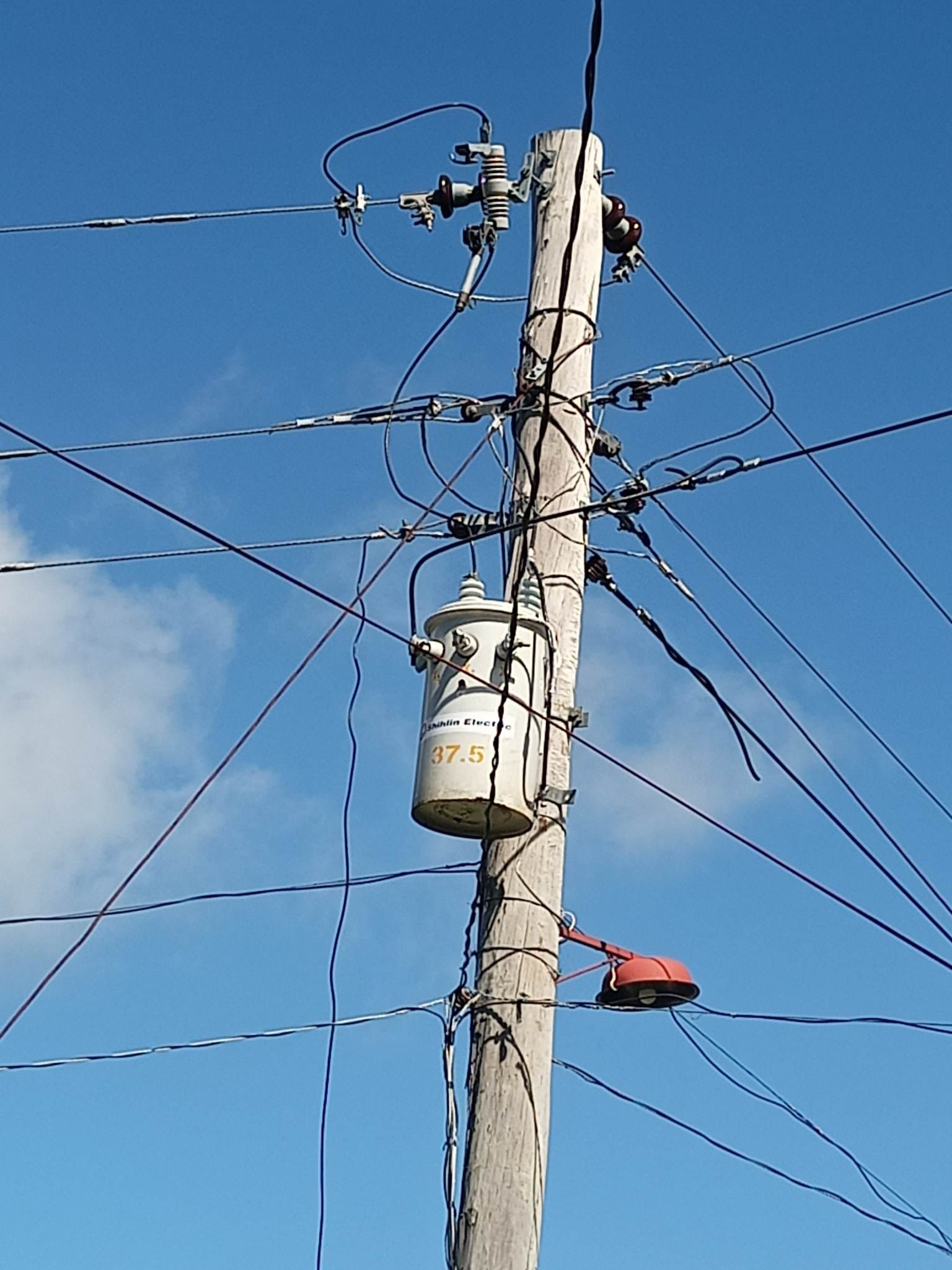 LOOK: ILECO III Technical Team conducted upgrading of 25kVA transformer ...